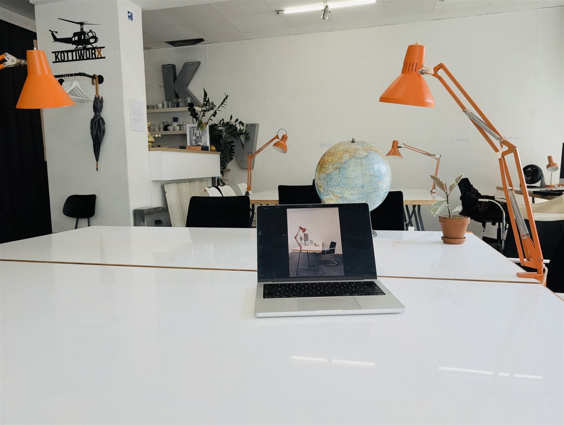 Detail of a workspace desk in the coworking space