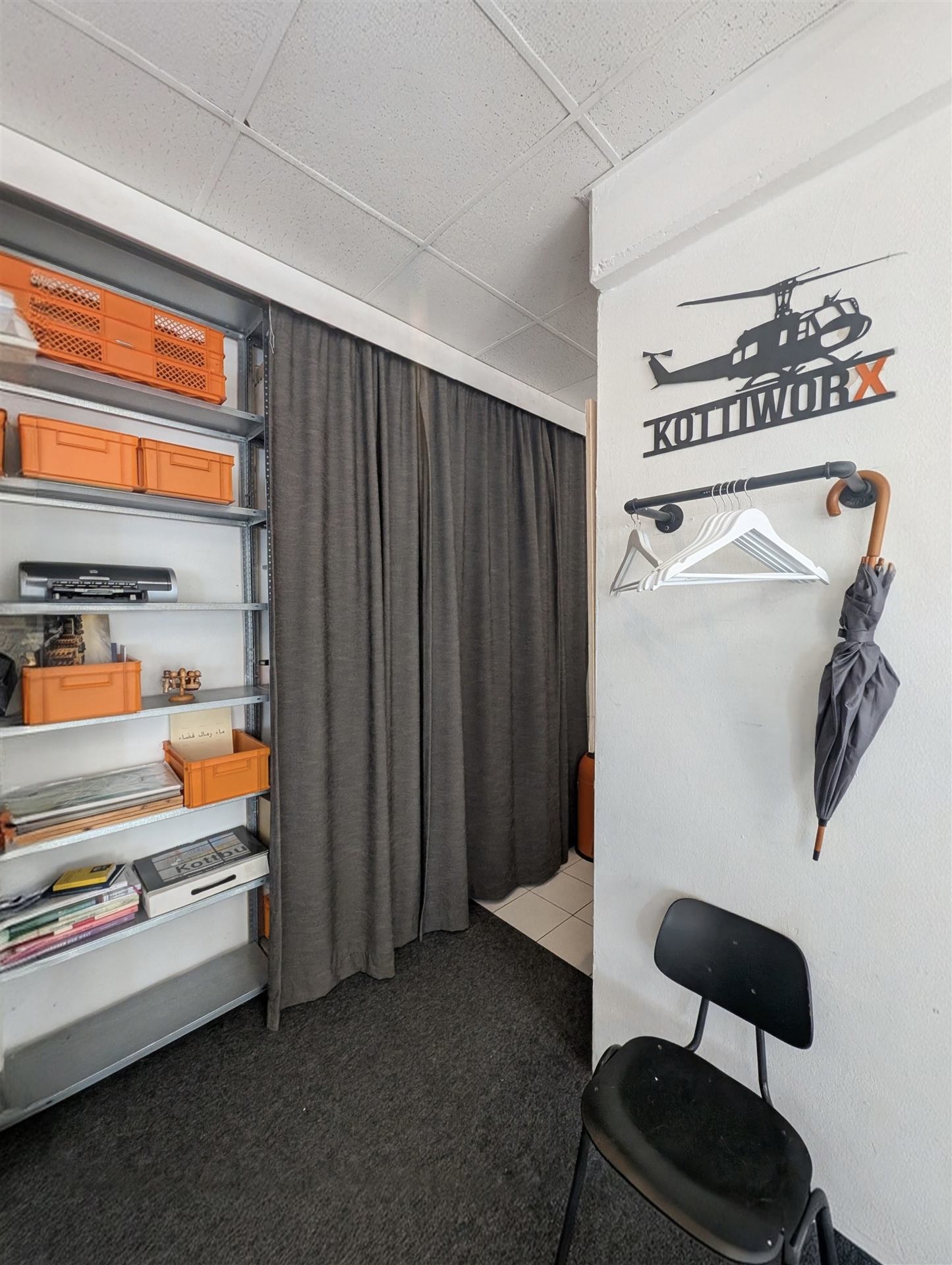 Shelves near the shared kitchen